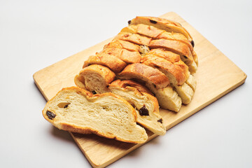 Slices of raisin bread closeup isolated in white background	
