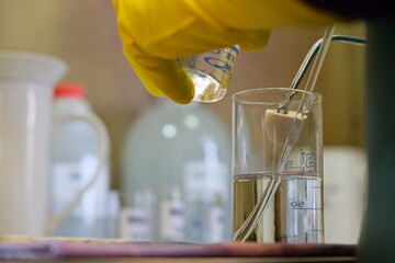 Khabarovsk territory / Russia - 03.22.2018 : Specialists of the metallurgical enterprise analyze the composition of ore