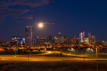 Moon over city at night