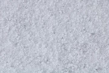 Closeup shot of clear white crystals of snow for background