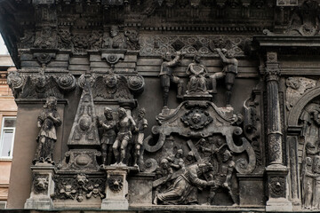 Fragment of sculptural decoration of the Boim Chapel facade in Cathedral Square in Lviv, Ukraine. August 2021