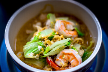 Background of food menu (stir-fried noodles with fresh shrimp), a cup for cooking at home or serving food to customers.
