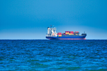container ship in the sea - obrazy, fototapety, plakaty