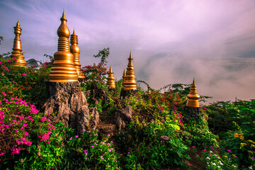 Naklejka premium Background of mountains and nature surrounded, bright blue sky wallpaper. There are trees, green leaves, a beautiful ecology.