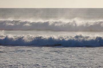 waves crashing on rocks