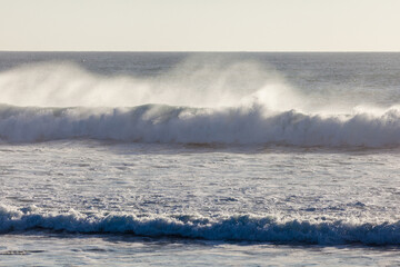 waves crashing on rocks