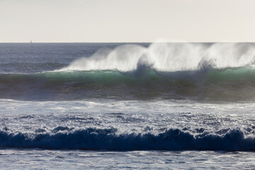 waves crashing on rocks