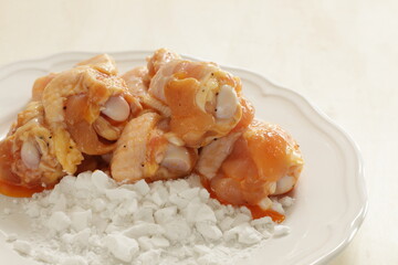 prepared chicken drumsticks on starch for fried chicken ingredient 