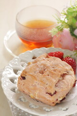 Homemade strawberry scone in pink color for breakfast image