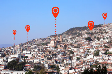 Network connection concept. Aerial view on Taxco de Alarcon city, Mexico with location pin. Global...