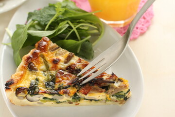 homemade French comfort food, mushroom and spinach quiche