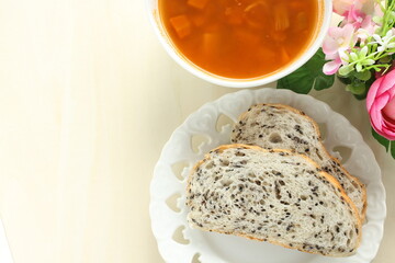 Homemade minestrone soup and black sesame seed bread