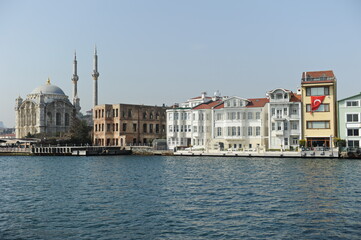 Istanbul / Turkey - 02.28.2017 : Coastal zone and architecture of the Bosphorus Strait. A bridge connecting Europe and Asia.