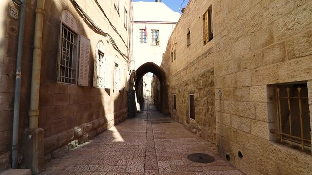 ancient stone-paved alley in the Jewish Quarter of the Old City of Jerusalem, in the morning