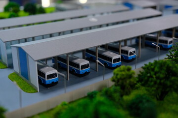Plastic layout - bus station and garages surrounded by trees