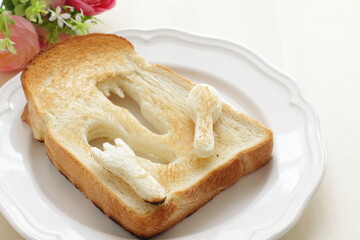 spoon and fork shaped bread for kid's breakfast image