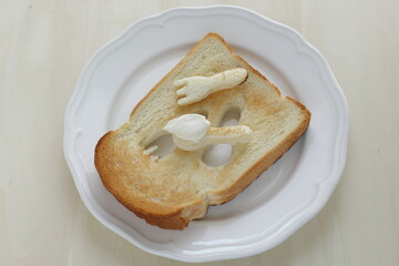 spoon and fork shaped bread for kid's breakfast image