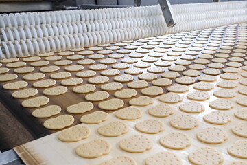 Shymkent, Kazakhstan-03.12.2020: Rakhat confectionery factory. Cutting out shaped cookies from the dough.