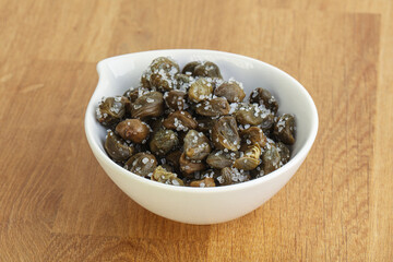 Salted marinated capers snack appetiser