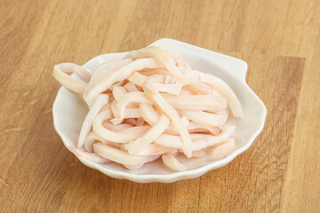 Marinated squid strips in the bowl
