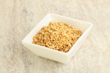 Crunched roasted peanut in the bowl