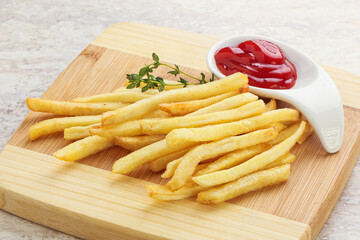 French fried potato over board