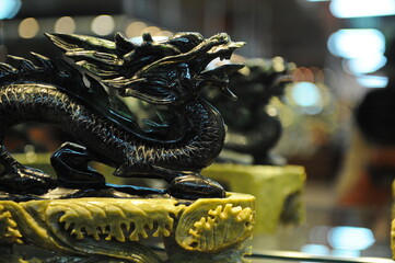 Beijing / China - 08.05.2012 : Dragon in the old Chinese style. Shop for carvings made of stone,...