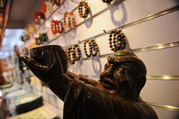 The figure of a man in Chinese style. Shop for carvings made of stone, jade and glass.