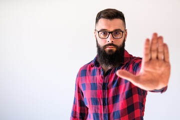 Naklejka premium Portrait of man who threatens. Copy space on image for your text or advert.