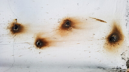 Rust steel bar appear from cement wall after building construction.