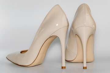Back view of the nude beige colored high heeled women's shoes.