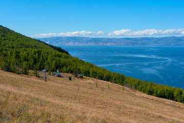 Lake Baikal at sunny summer day. Beauty of nature concept. Soft focus