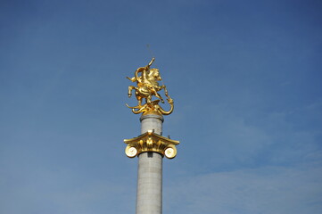 Fototapeta na wymiar Georgia / Tbilisi - 10.26.2012 : Monument to Saint George the victorious, slaying the dragon, Freedom square.
