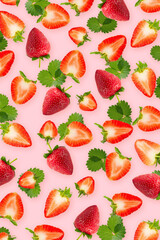 Fresh strawberries isolated on a pink wallpaper background