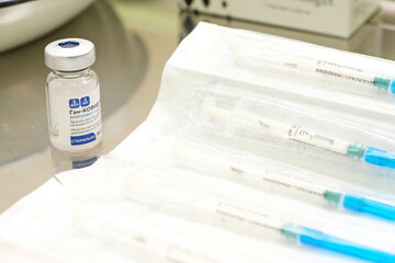 Almaty, Kazakhstan - 02.01.2021 : The Russian-made vaccine against covid 19 - Gam Covid Vac is on the table in the laboratory