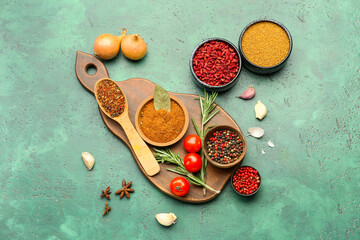 Composition with different spices and vegetables on color background