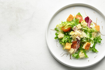 Plate of tasty vegan Caesar salad on white background, closeup