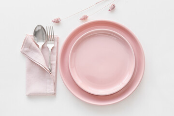 Elegant table setting with flowers on white background