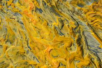 Abstract color - Orange poison from a gold mine - pollution