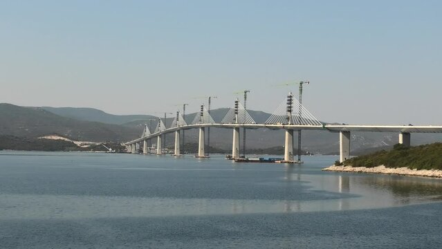 Peljesac Bridge of Croatia in construction site. Connecting the southeastern Croatian exclave to rest of the Croatia bypassing Bosnia and Herzegovina. Under construction from July 2018 to June 2022.