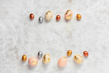 Composition with Easter eggs on light background