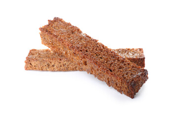 Tasty rye croutons on white background