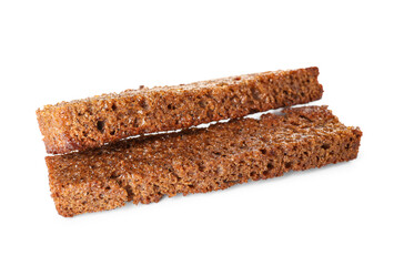 Tasty rye croutons on white background