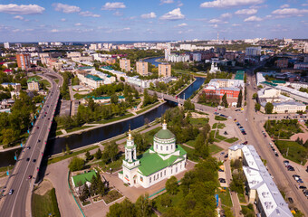 Aerial view of historic center of old Russian city of Oryol on banks of Orlik River with ancient Michael Archangel (Assumption) Church