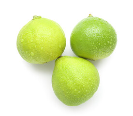 Ripe bergamot fruits with water drops on white background