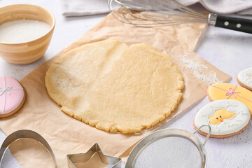 Fresh dough for preparing tasty Easter cookies on table