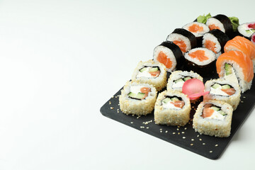 Concept of tasty food with sushi, space for text