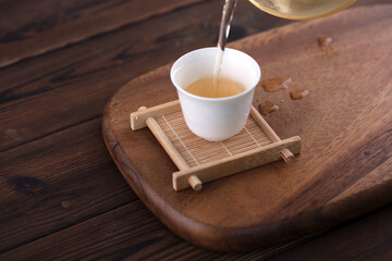 Pour a cup of tea and drink tea culture