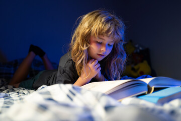 Kid boy reading books. Dreaming child read bedtime stories, fairystory or fairytale.