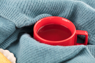 Hot tea wrapped in a sweater